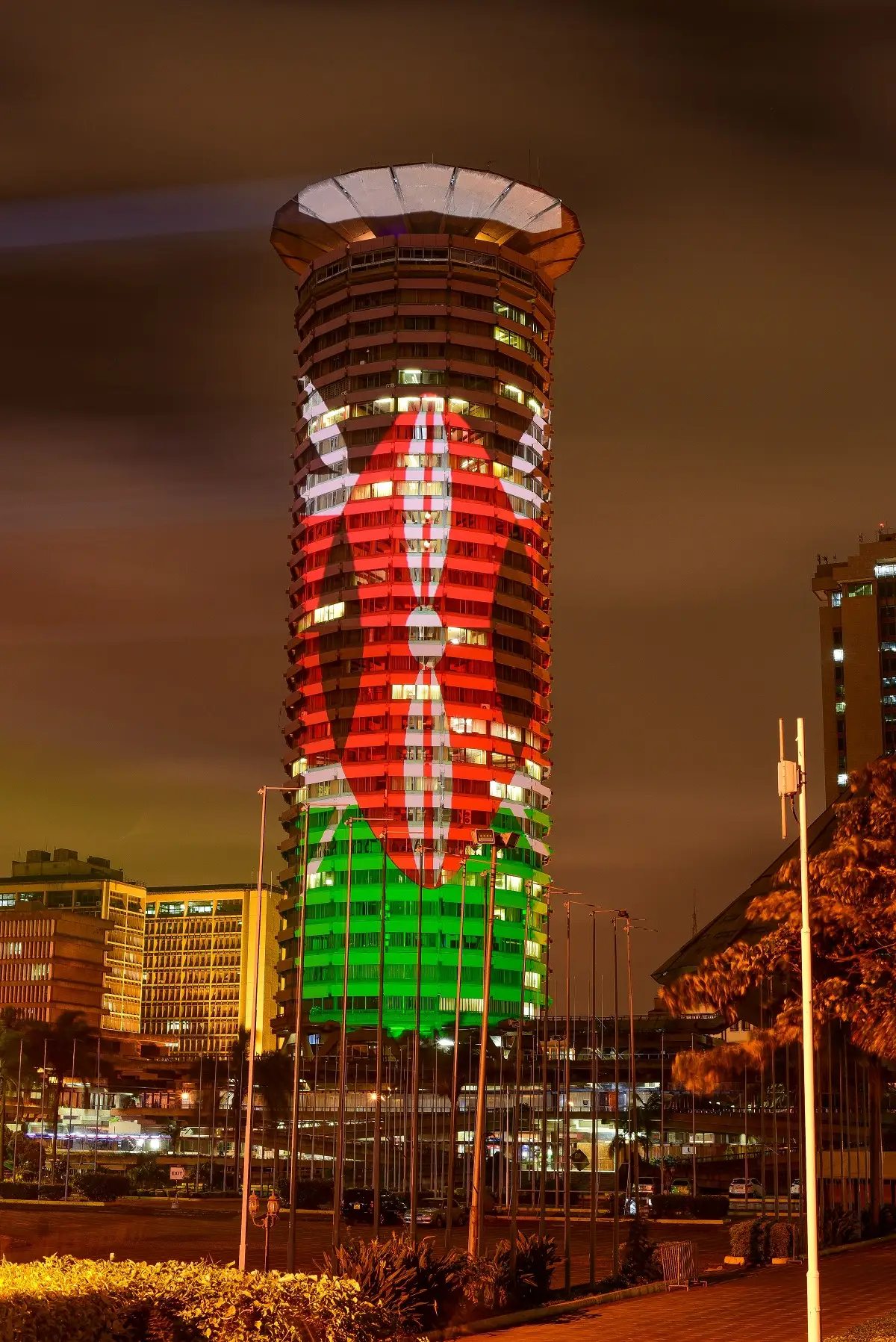 KICC tower in Nairobi lit in the colours of the Kenyan flag at night