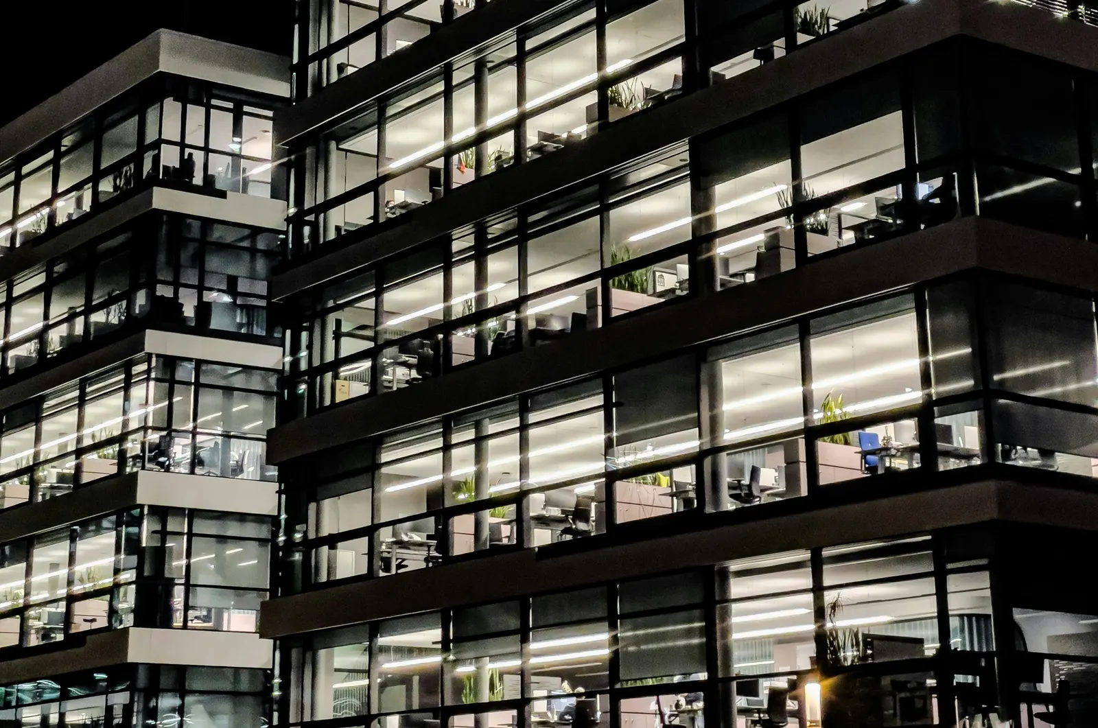 Office building with every floor lit at night
