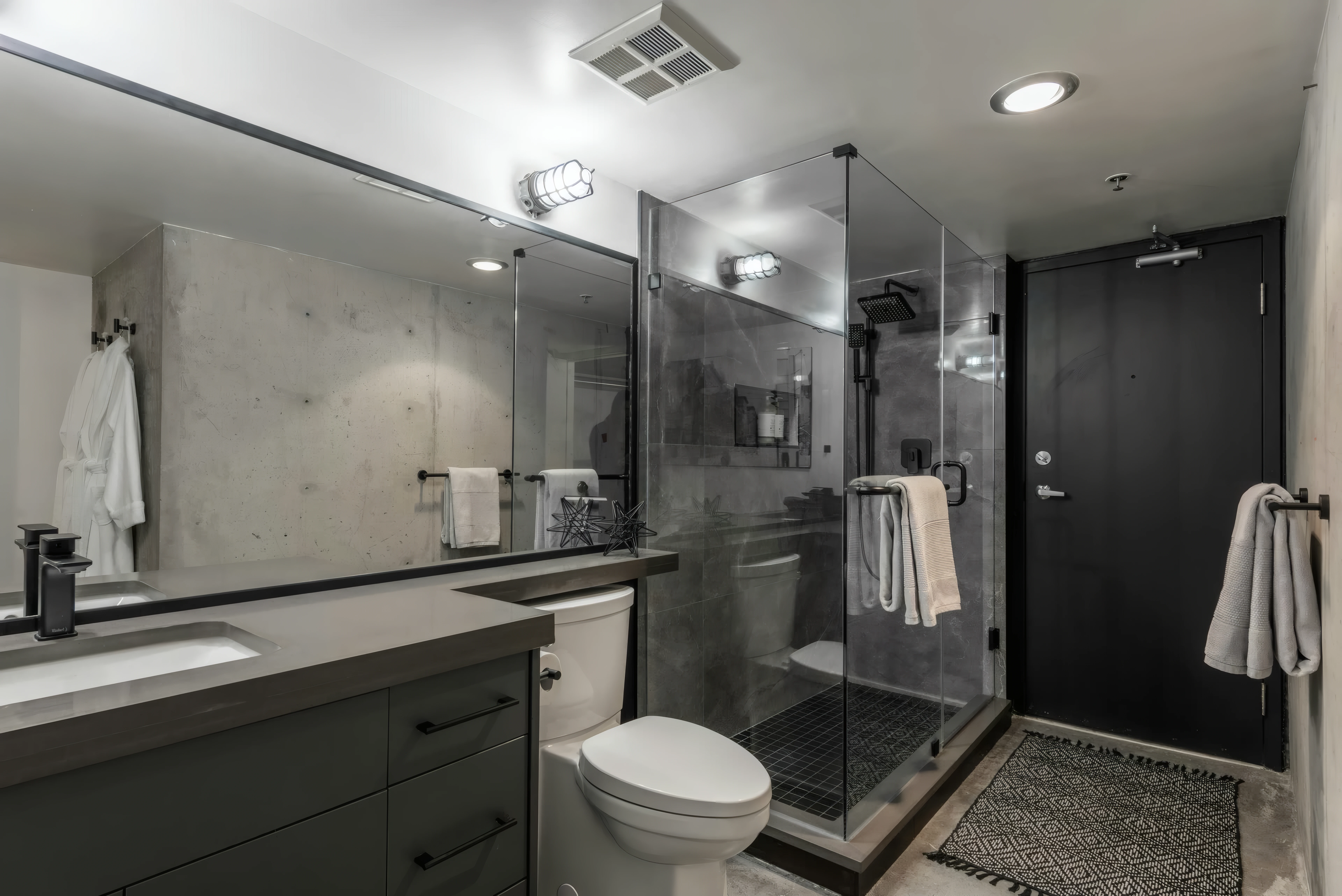 LED backlit mirror above a Nairobi bathroom vanity