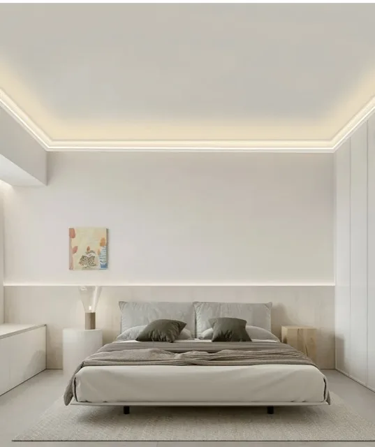 Bedroom ceiling lit by a cove of light from the cornice