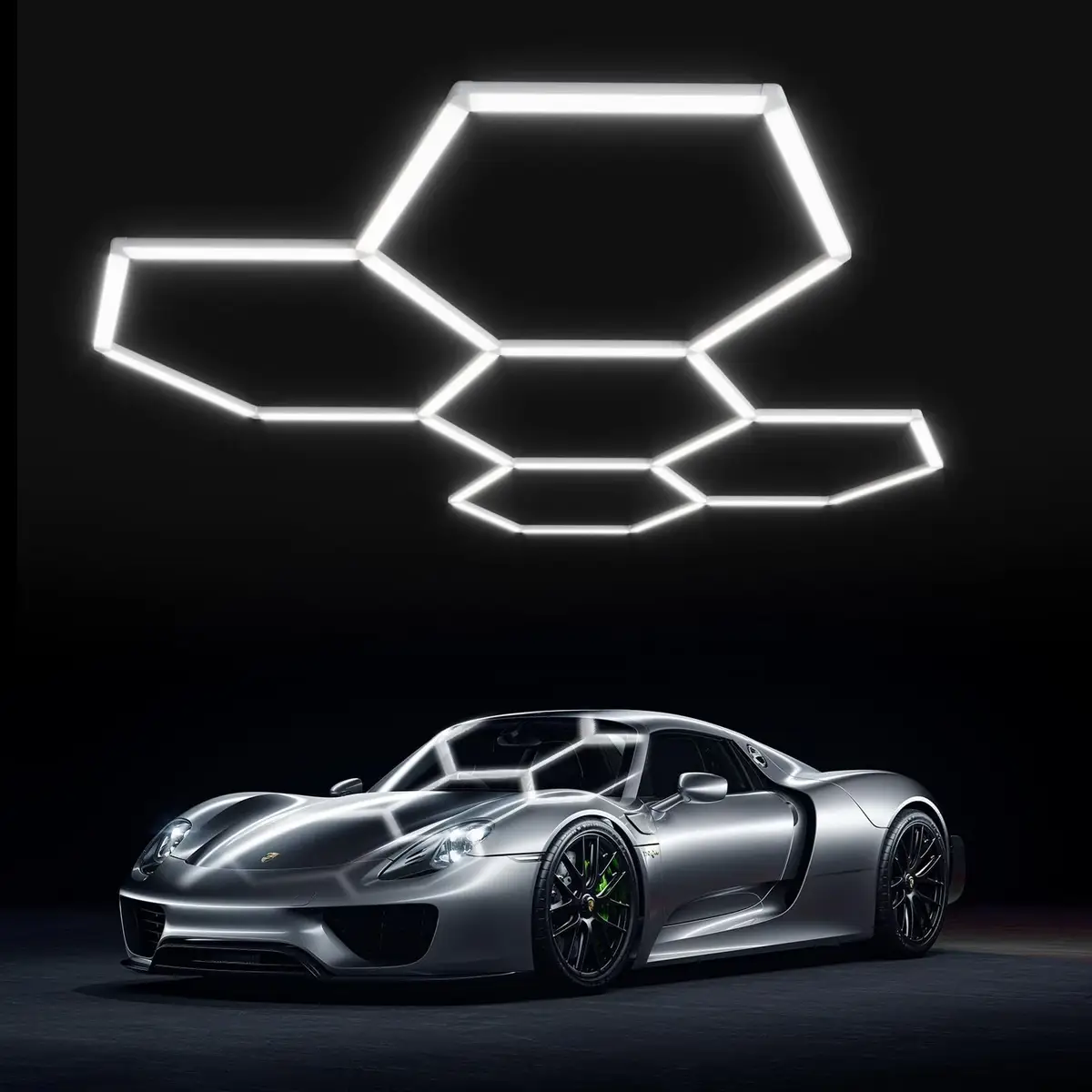 Sports car under a cluster of glowing hexagon ceiling lights